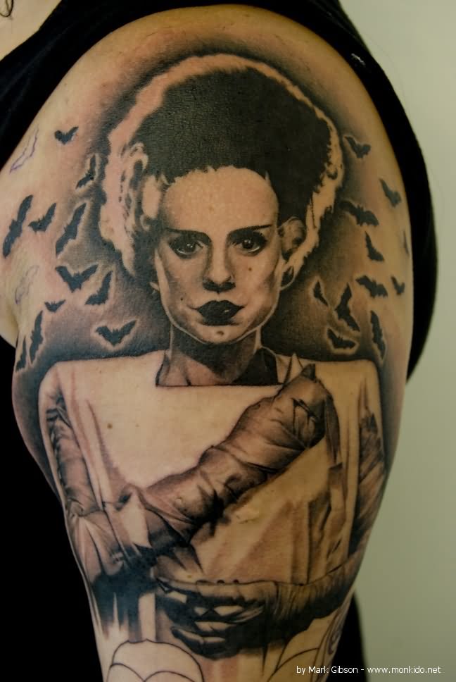 Attractive Frankenstein Bride With Flying Bats Tattoo On Shoulder