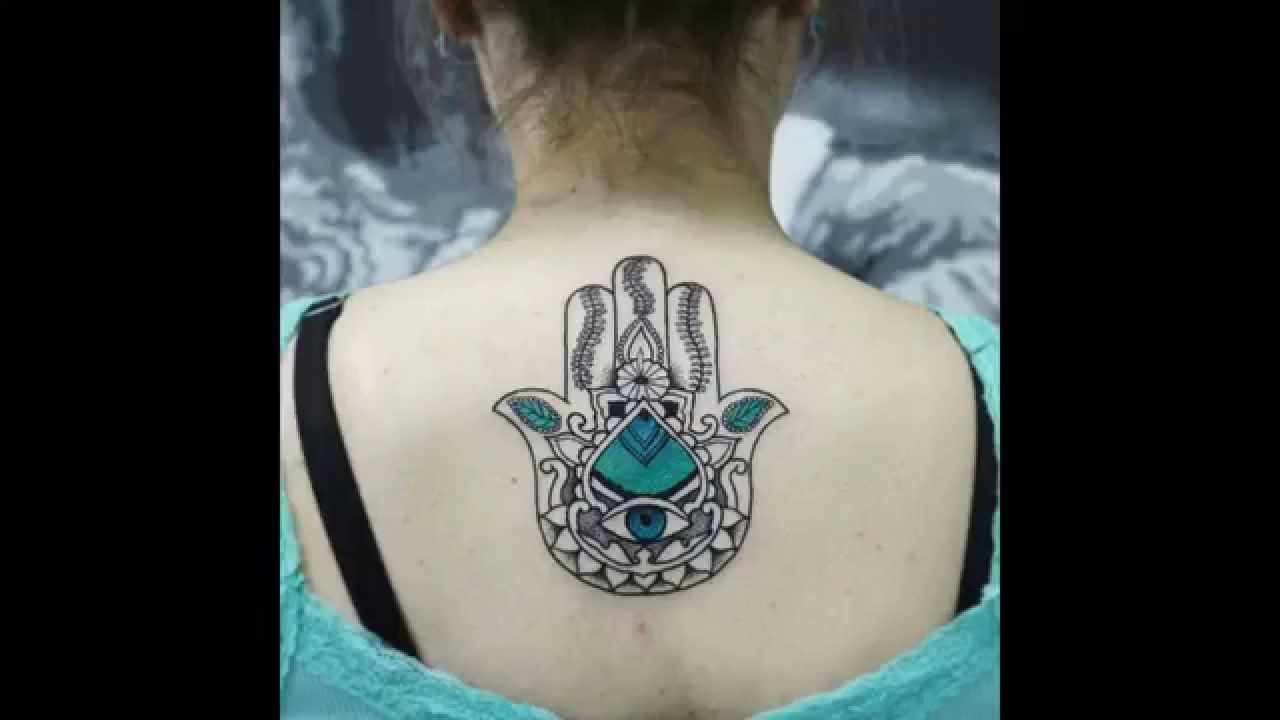 Attractive Hamsa Tattoo On Girl Upper Back