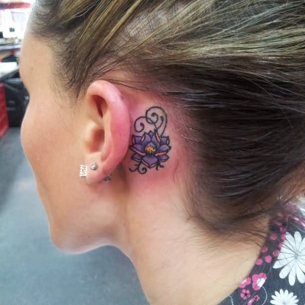 Attractive Lotus Flower Tattoo On Girl Left Behind The Ear
