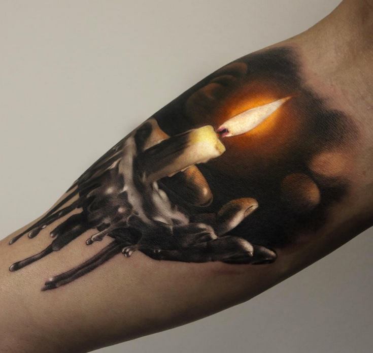 Awesome Burning Candle On Hand Tattoo On Bicep by Gary Mossman