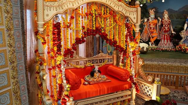 Bal Gopal Sitting In A Fragrant Flower Decorated Swing On Krishna Janmashtami