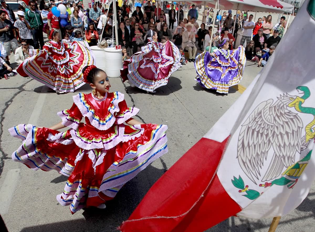 Beautiful Girls Dancing During Cinco de Mayo Celebrations