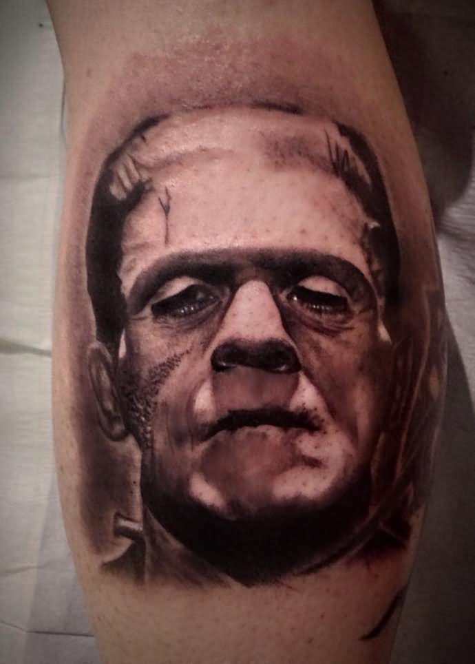 Black And Grey 3D Frankenstein Head Tattoo Design For Leg Calf