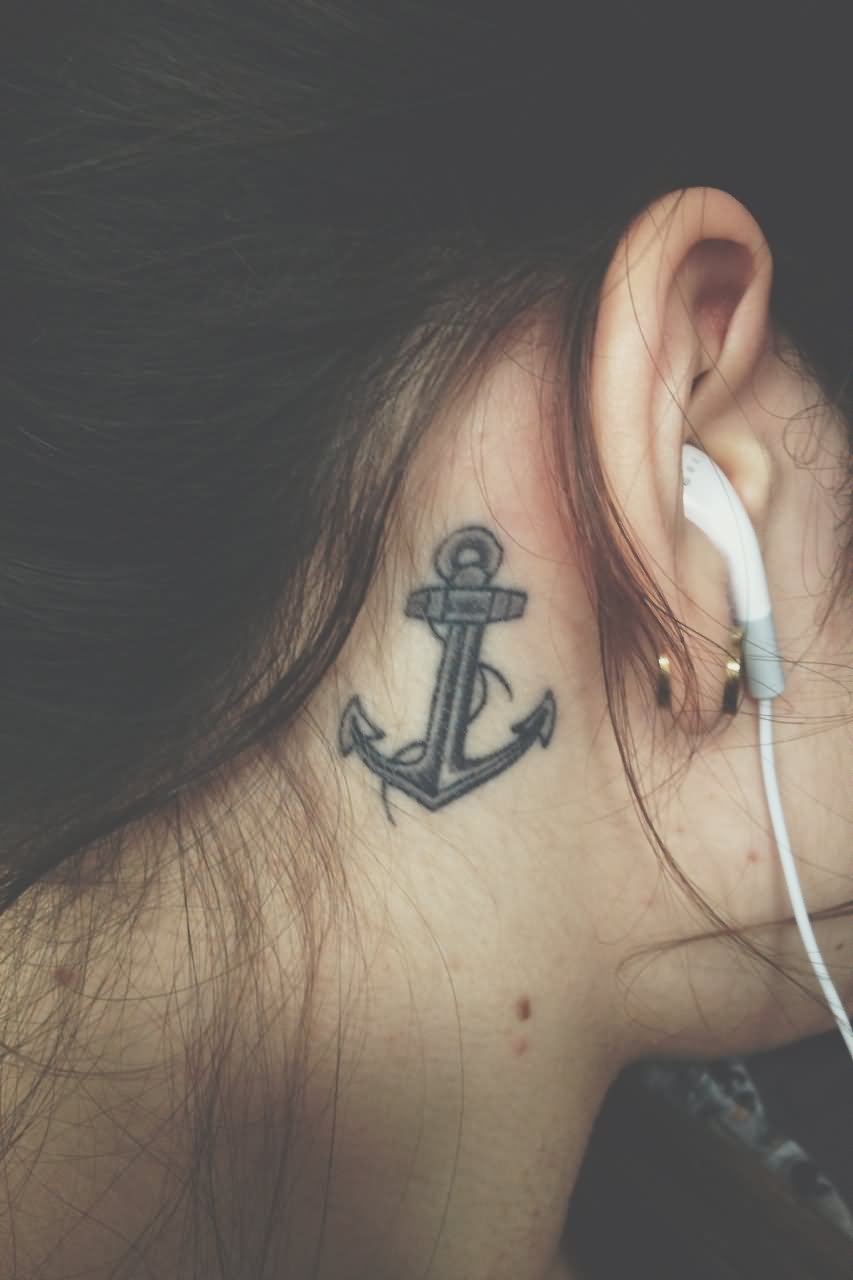 Black And Grey Anchor Tattoo On Girl Right Behind The Ear