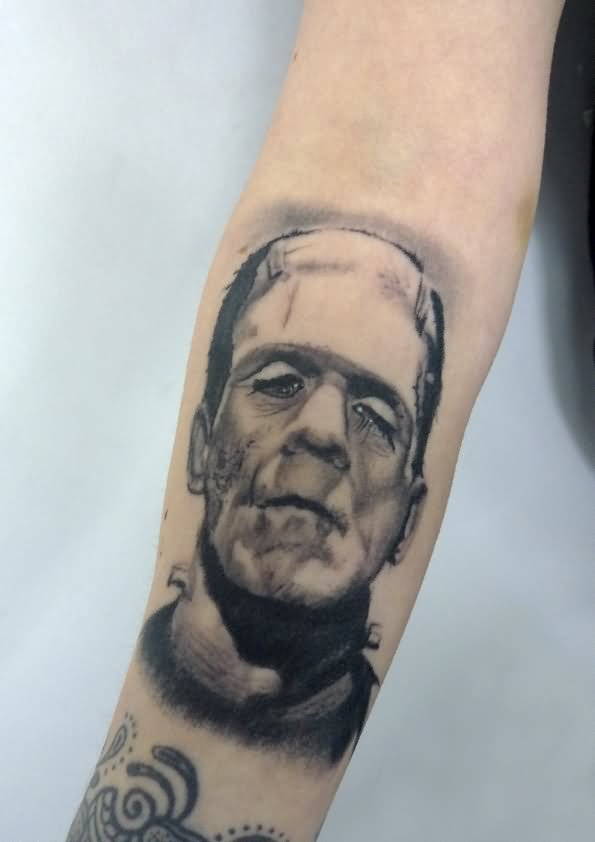 Black And Grey Frankenstein Head Tattoo Design For Forearm By Max