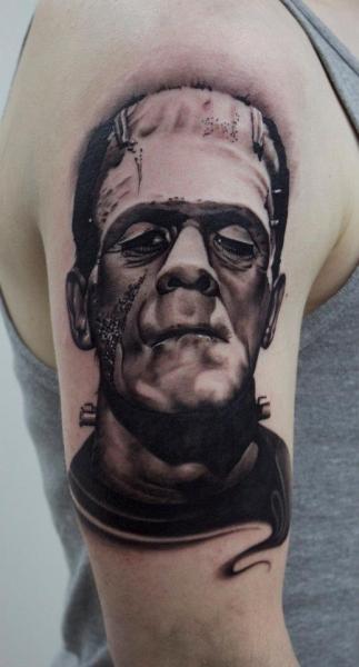 Black And Grey Frankenstein Head Tattoo On Right Half Sleeve