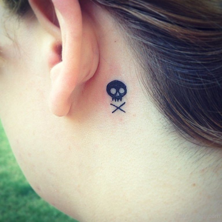 Black Danger Skull Tattoo On Left Behind The Ear