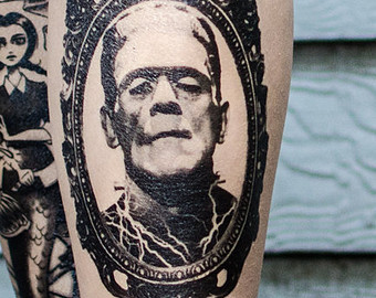 Black Frankenstein In Frame Tattoo Design