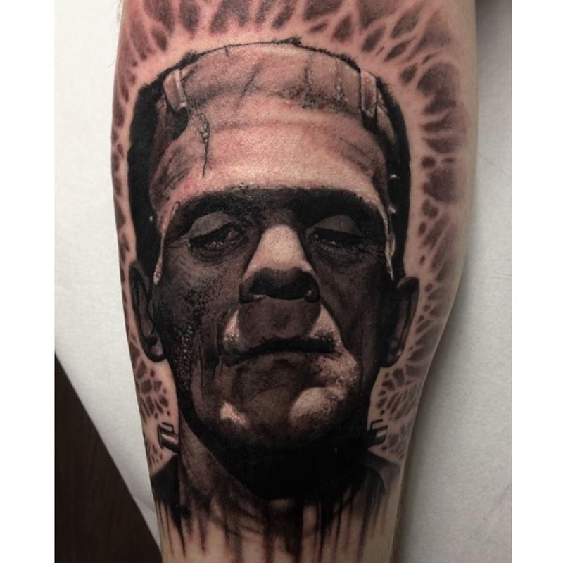 Black Ink 3D Frankenstein Head Tattoo Design For Sleeve