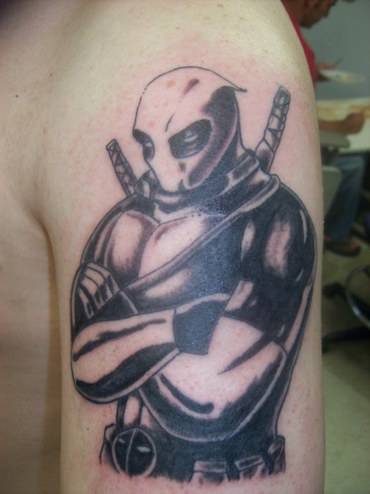Black Ink Deadpool Tattoo On Left Half Sleeve By Scott White