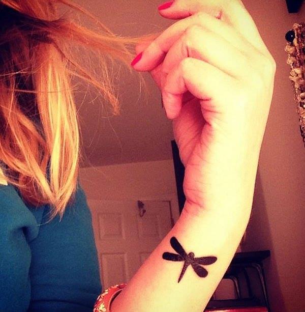 Black Ink Dragonfly Tattoo On Left Forearm