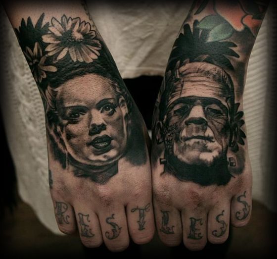 Black Ink Frankenstein And Bride Head Tattoo On Both Hand