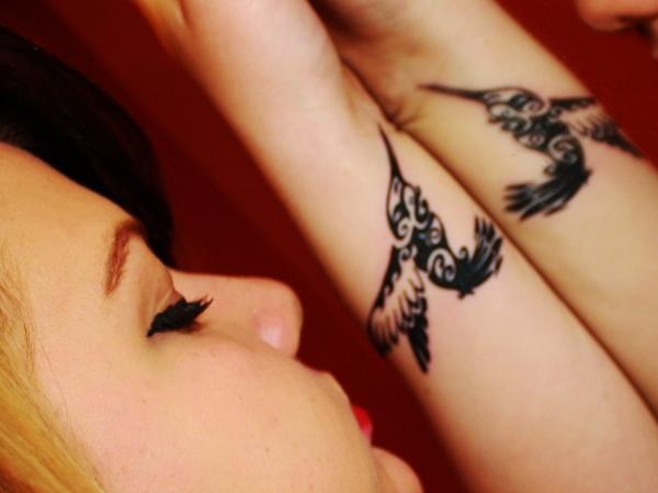 Black Ink Tribal Colibri Tattoos On Wrist