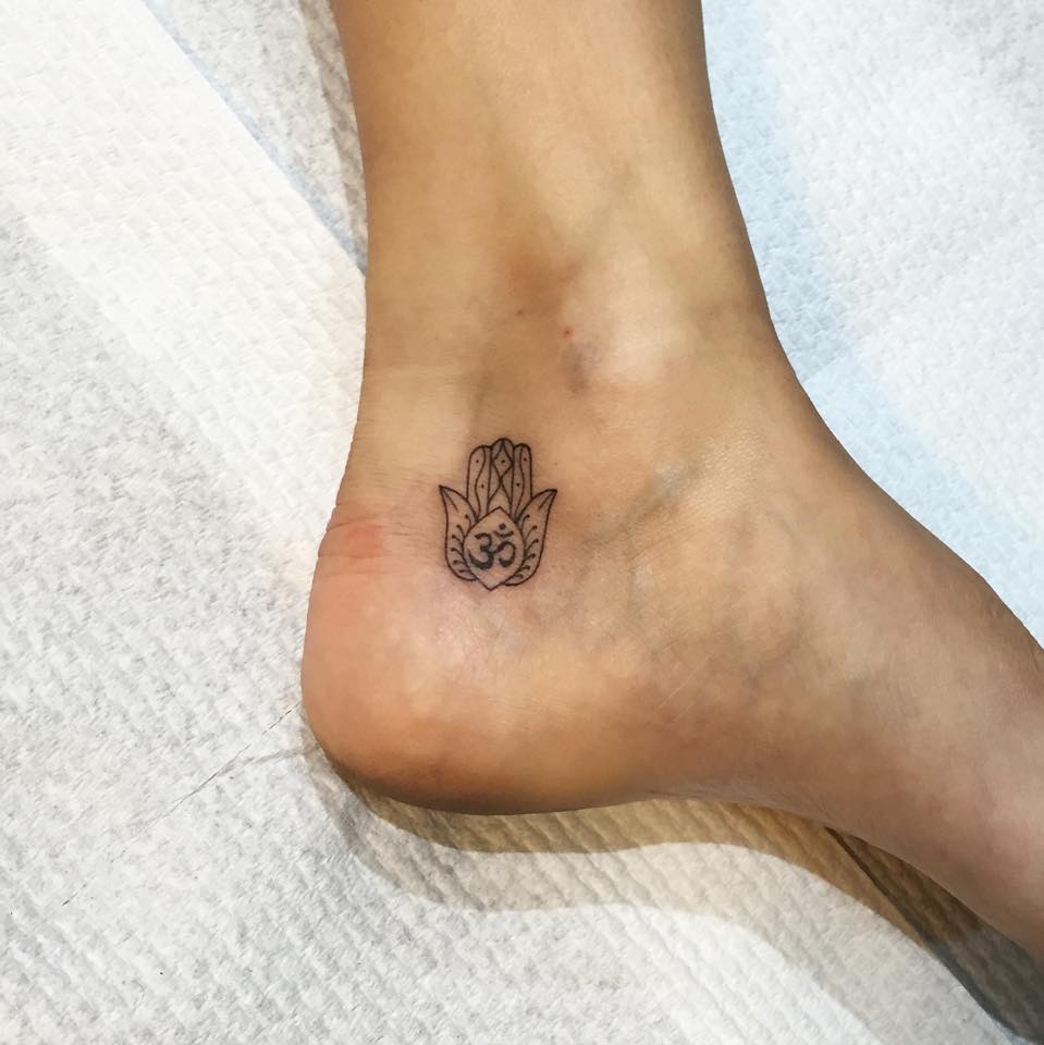 Black Little Om Hamsa Tattoo On Ankle
