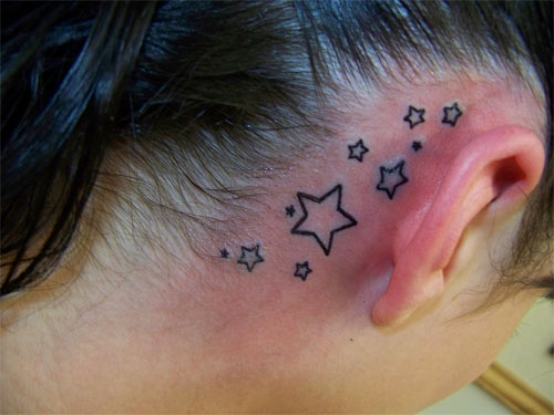 Black Outline Stars Tattoo On Right Behind The Ear