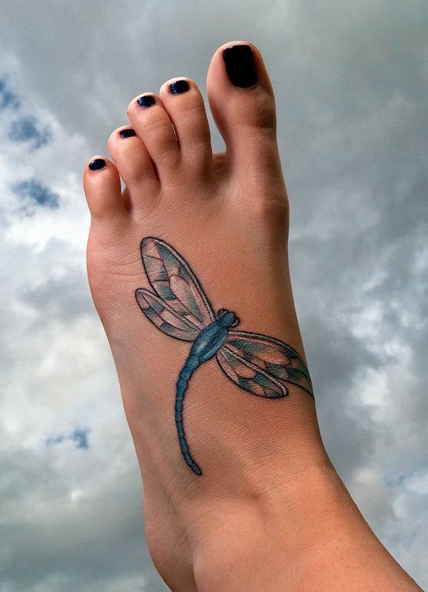 Blue Ink Dragonfly Tattoo On Left Foot For Girls