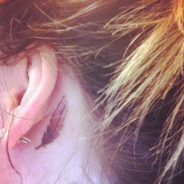 Classic Feather Tattoo On Left Behind The Ear