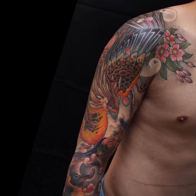 Color Phoenix Tattoo On Man Right Sleeve