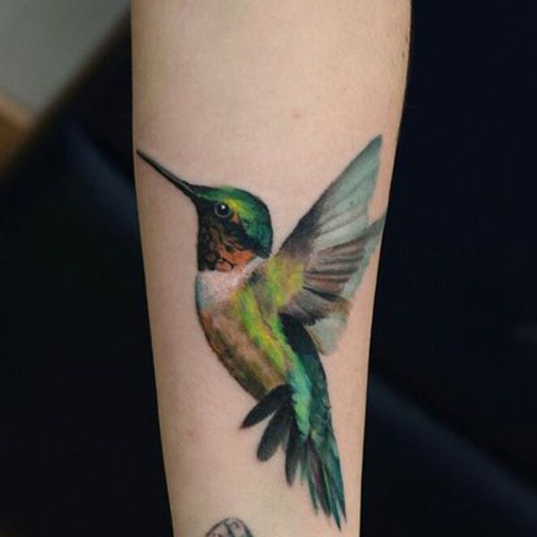 Colored Colibri Tattoo On Left Arm