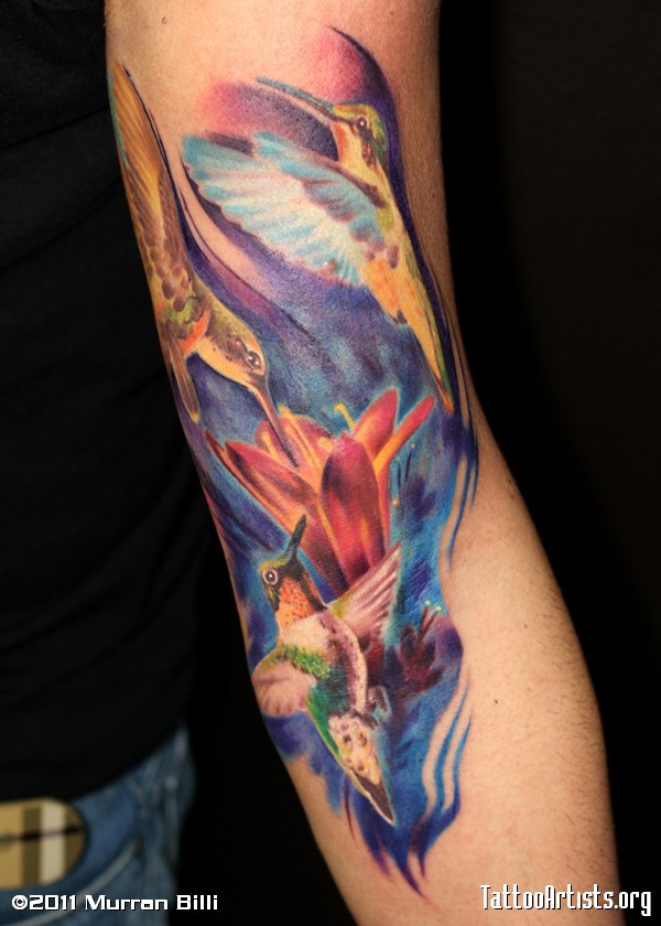 Colored Colibri Tattoo On Left Forearm