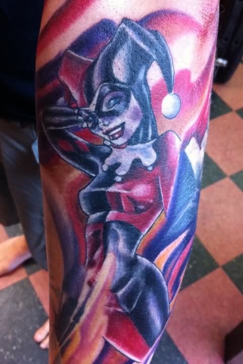 Colored Harley Quinn Tattoo On Left Sleeve