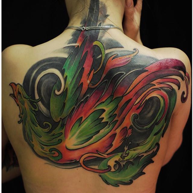 Colored Phoenix Tattoo On Upper Back