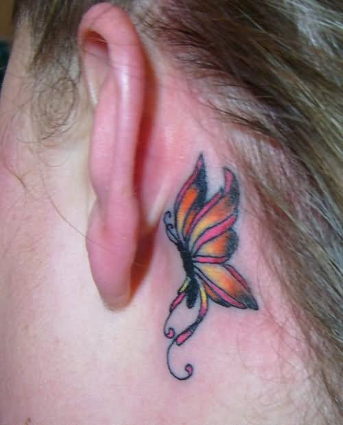 Colorful Butterfly Tattoo On Left Behind The Ear