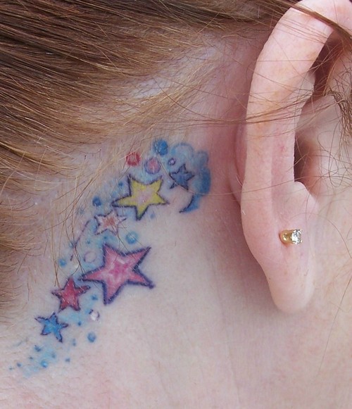 Colorful Stars Tattoo On Right Behind The Ear