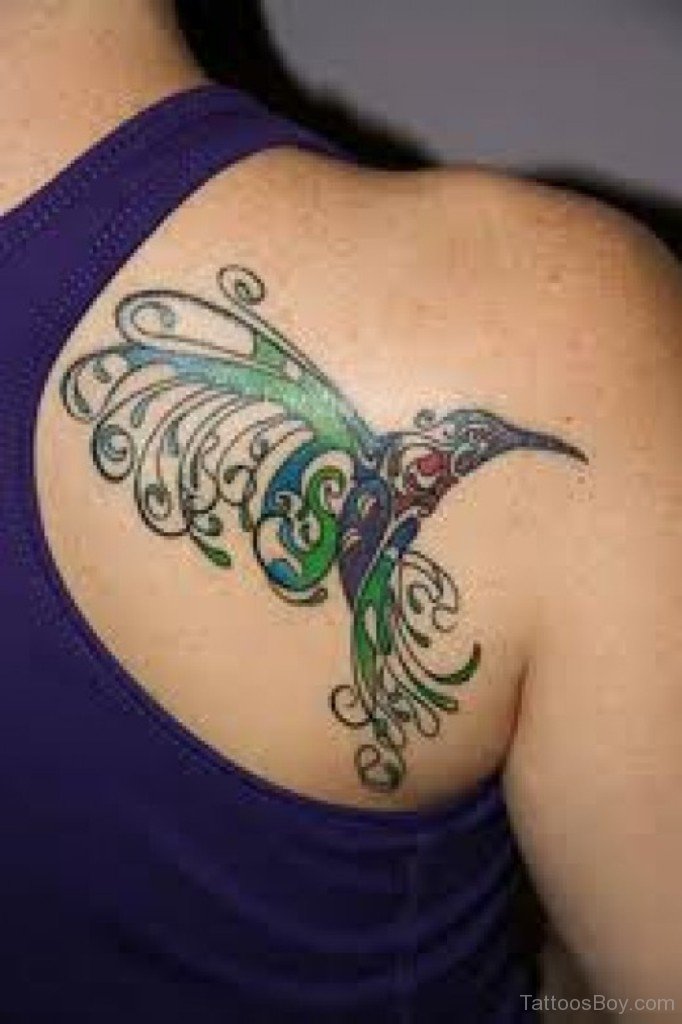 Colorful Tribal Colibri Tattoo On Back Shoulder
