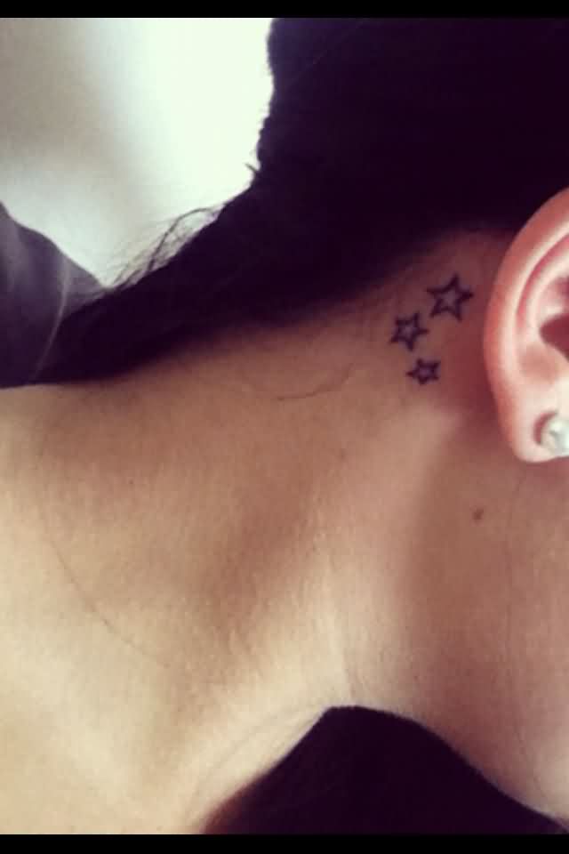 Cool Black Outline Stars Tattoo On Right Behind The Ear