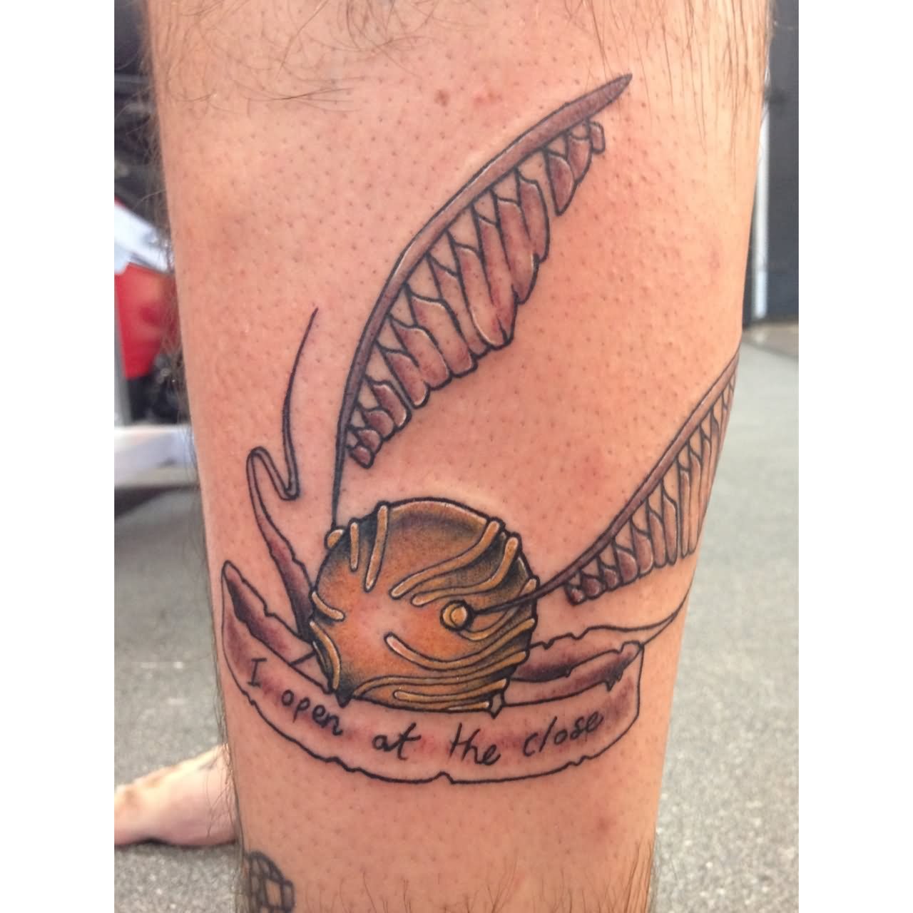 Cool Snitch With Banner Tattoo On Left Leg Calf