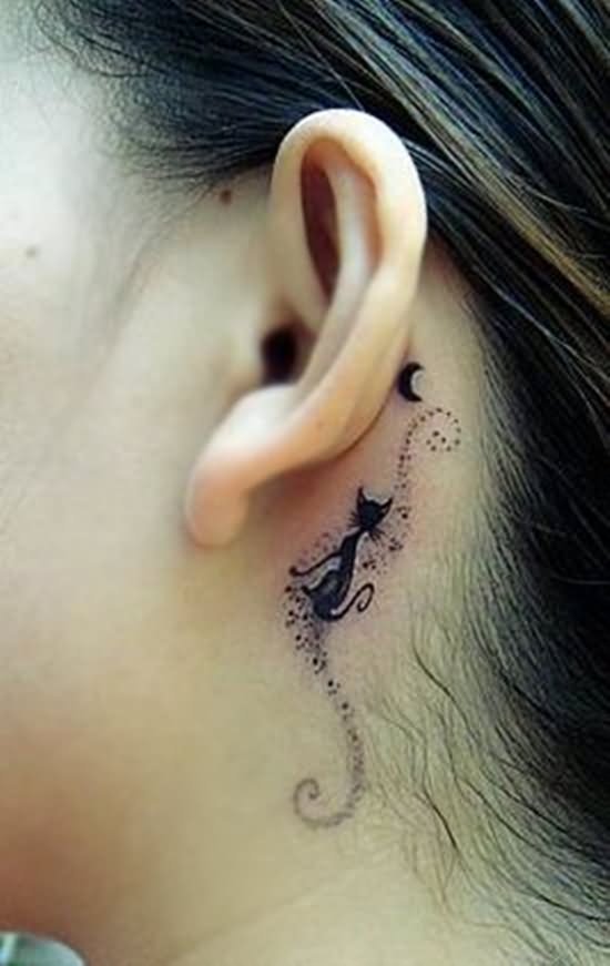 Cute Black Cat With Half Moon Tattoo On Left Behind The Ear