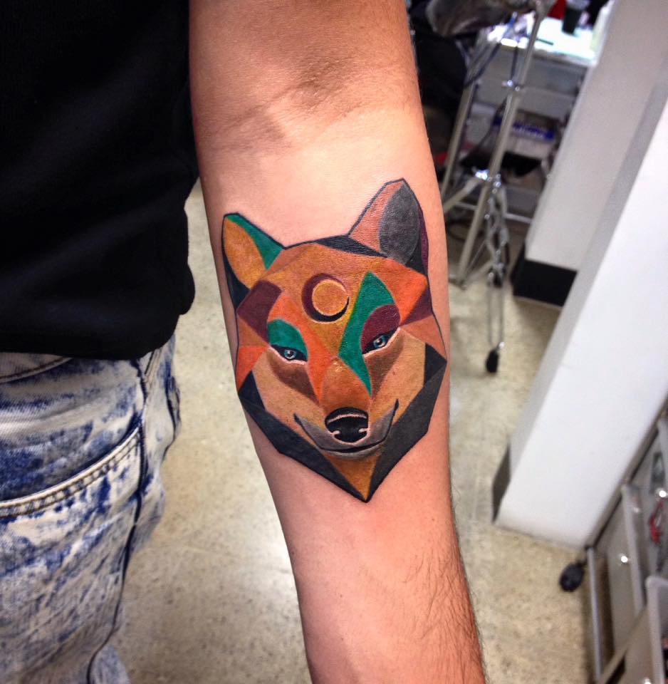 Cute Wolf Head Tattoo On Left Forearm by Daniel Rozo