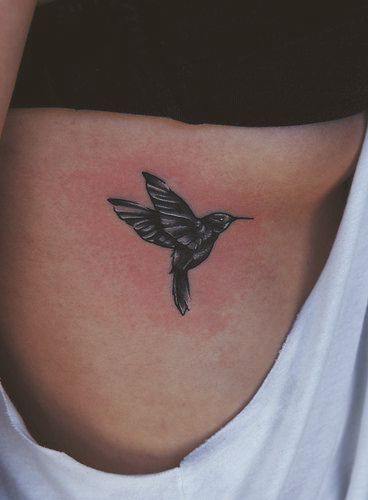 Dark Ink Colibri Tattoo On Side Rib