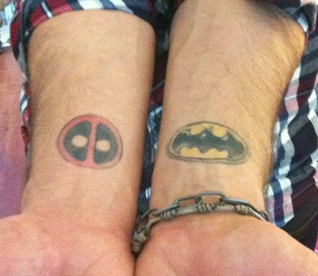 Deadpool And Batman Symbol Tattoo On Both Wrist