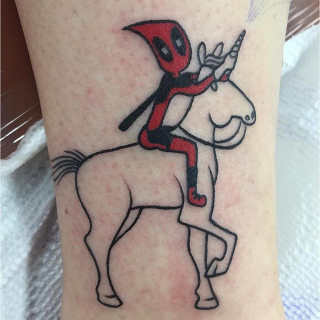 Deadpool On Unicorn Tattoo Design