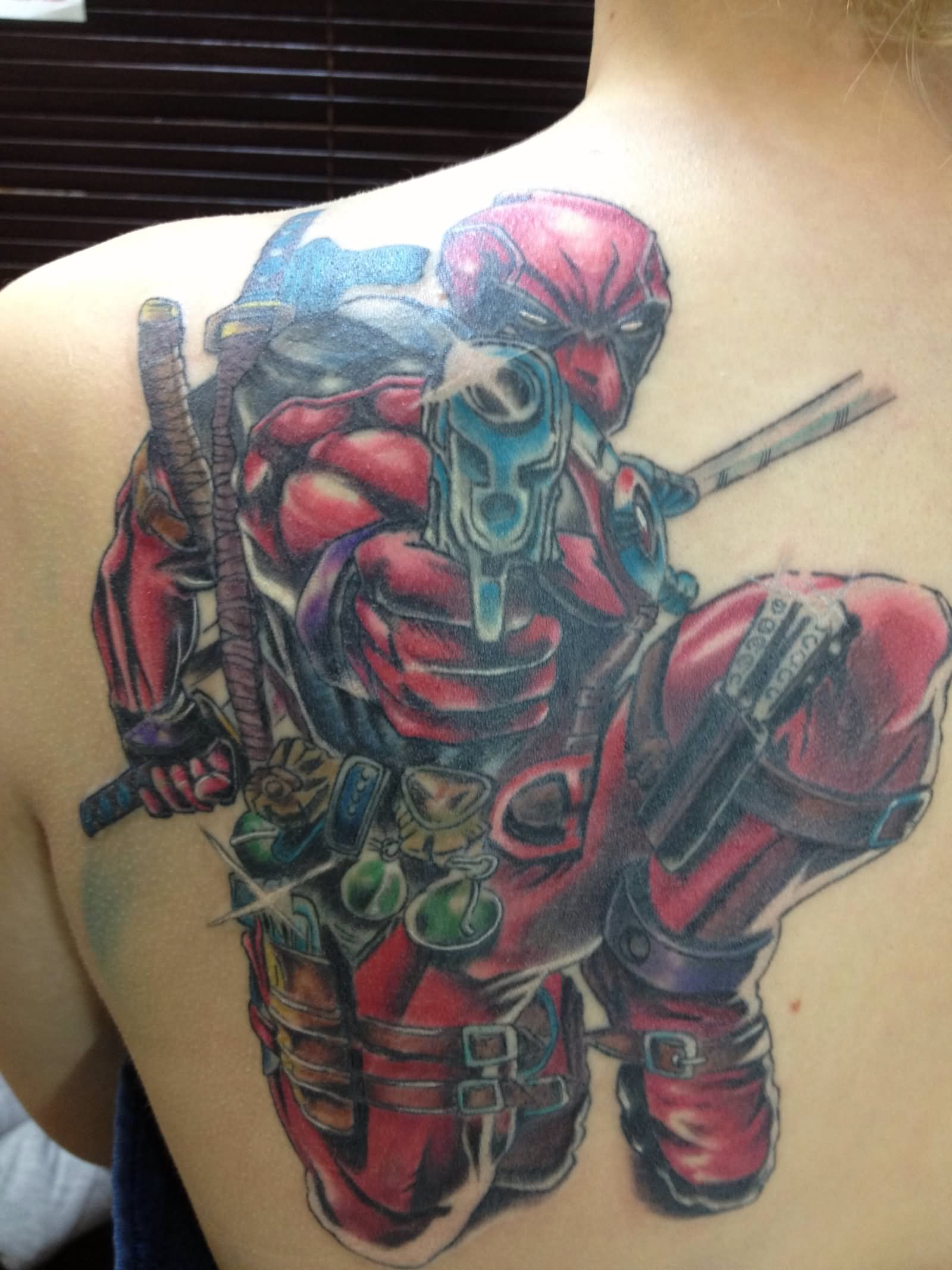 Deadpool Tattoo On Left Back Shoulder
