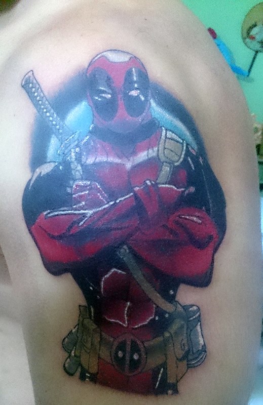 Deadpool Tattoo On Left Half Sleeve
