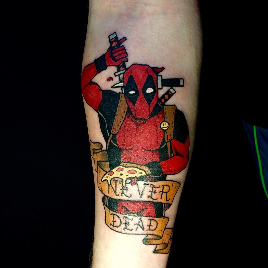 Deadpool With Never Dead Banner Tattoo Design For Forearm