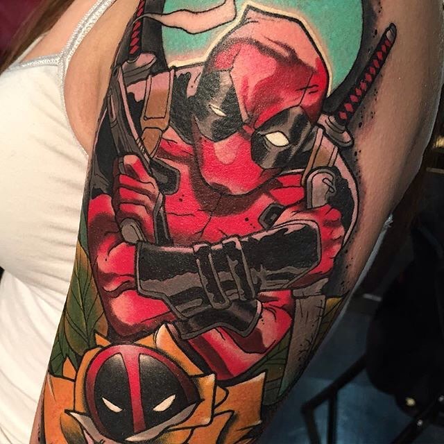 Deadpool With Rose Tattoo On Women Left Half Sleeve