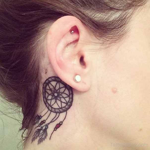 Dreamcatcher Tattoo On Girl Right Behind The Ear