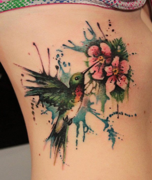 Flowers And Colibri Tattoo On Side Rib