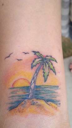 Flying Birds And Palm Tree Tattoo