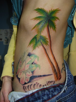 Girl Showing Her Side Rib Palm Tree Tattoo