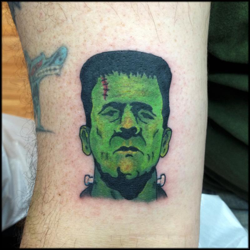 Green Ink Frankenstein Head Tattoo Design For Sleeve