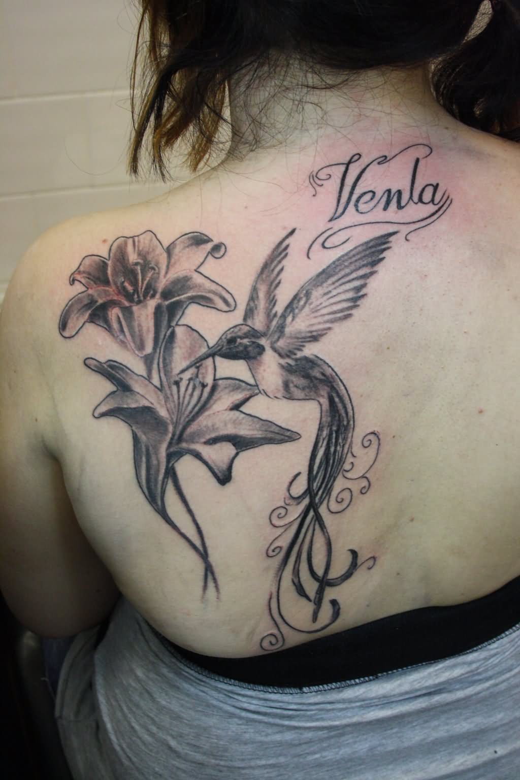 Grey Flower And Tribal Colibri Tattoo On Back Shoulder