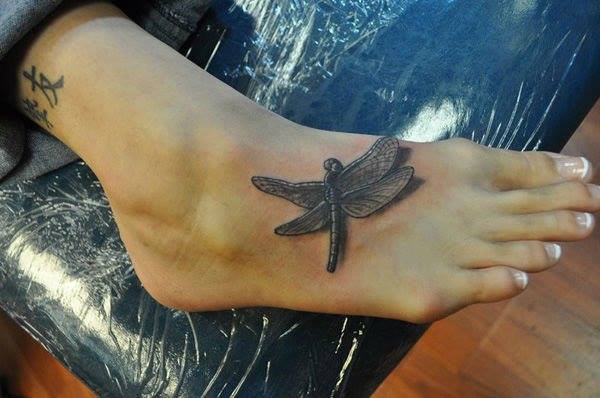 Grey Ink 3D Dragonfly Tattoo On Right Foot