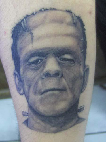Grey Ink Frankenstein Head Tattoo Design