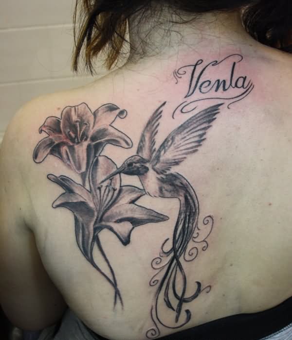 Grey Ink Lily Flowers And Colibri Tattoo On Girl Back