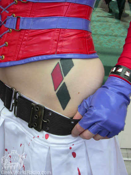 Harley Quinn Symbol Tattoo On Girl Left Hip
